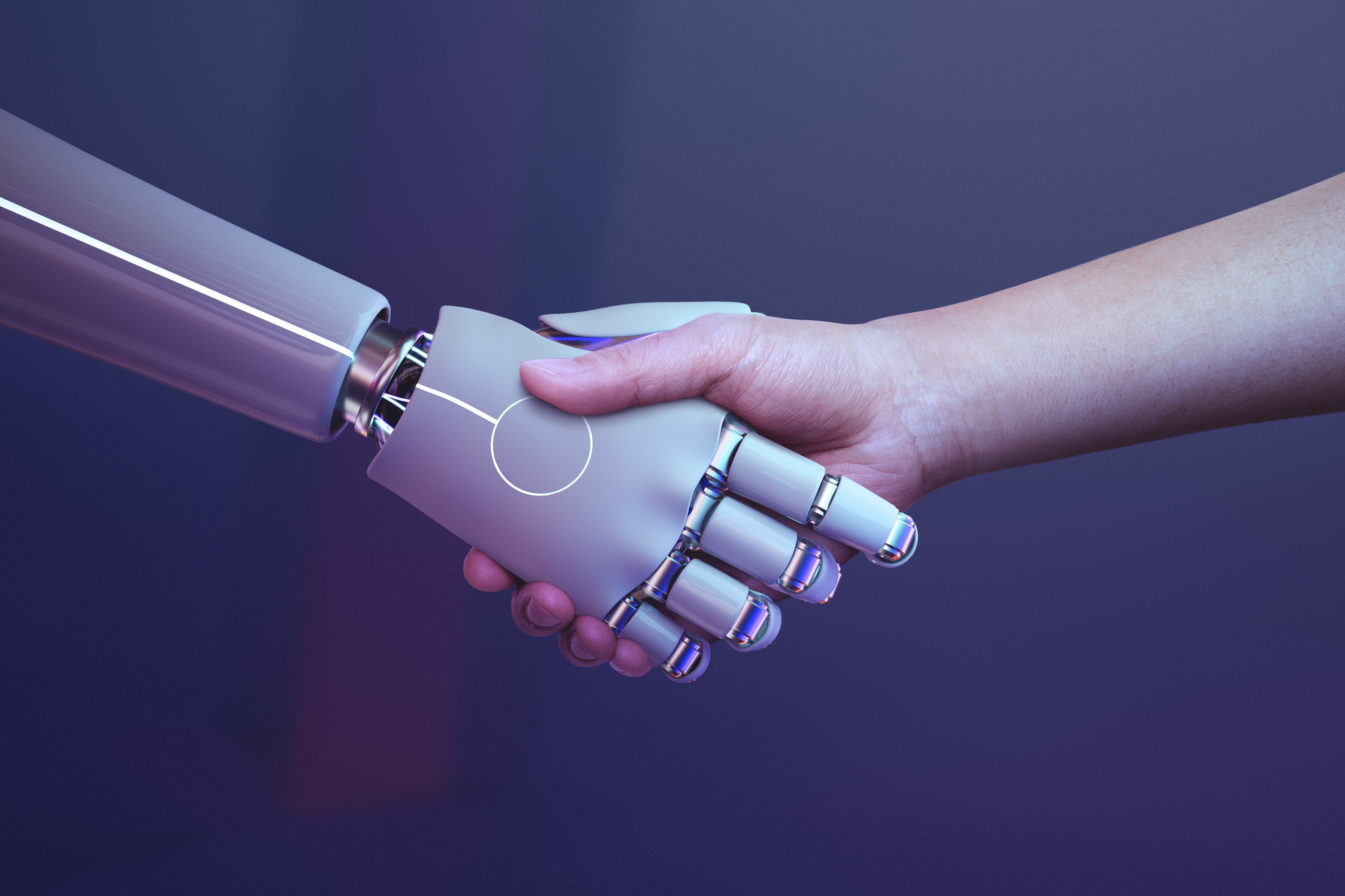 Aperto de mãos entre robô e ser humano