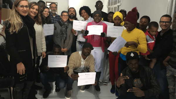 Haitian immigrants receive Portuguese course certificate
